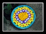 Flowers floating on water at a resort.